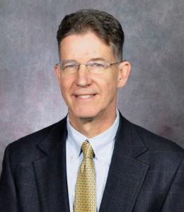Official portrait of Director of Administrative Office of the Courts Zach Ramsey.