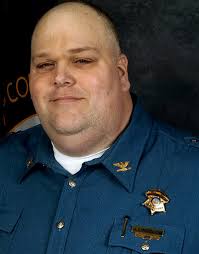 Official portrait of Joshua Lindblom. 