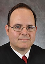 Official portrait of Judge William "Bo" Leach. 