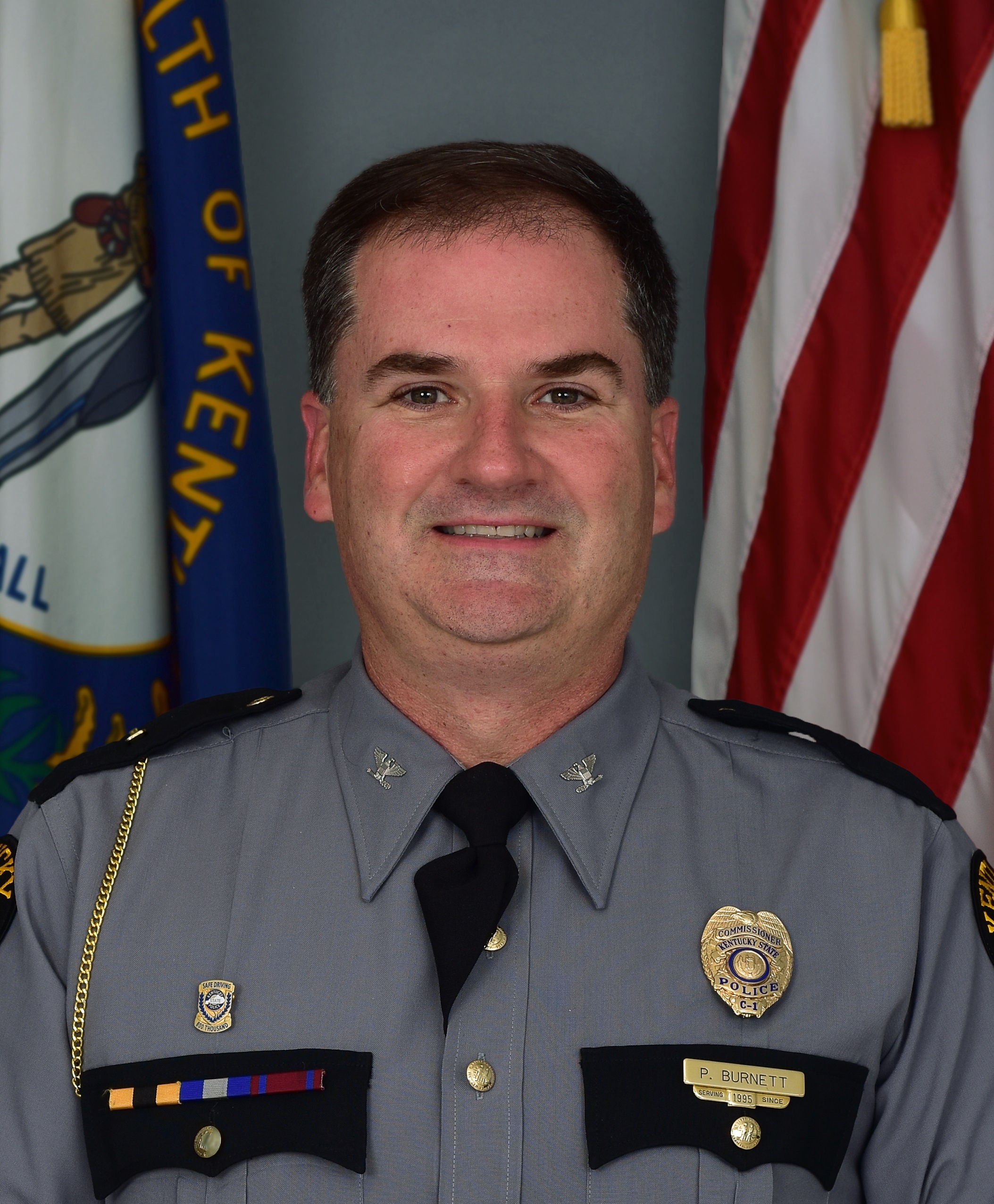 Official portrait of Colonel Phillip Burnett, Jr.
